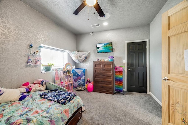 9414 Greenton Rd, Odessa, MO 64076 - bedroom featuring a textured wall, carpet floors, a textured ceiling, and ceiling fan