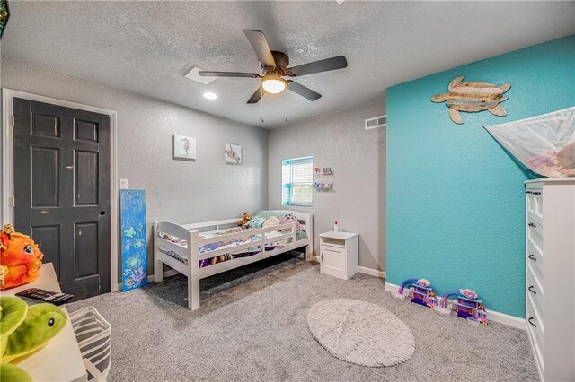 9414 Greenton Rd, Odessa, MO 64076 - bedroom with a textured wall, a textured ceiling, a ceiling fan, and carpet