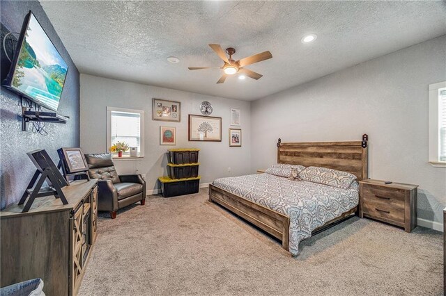 9414 Greenton Rd, Odessa, MO 64076 - carpeted bedroom with a textured ceiling, a ceiling fan, and recessed lighting