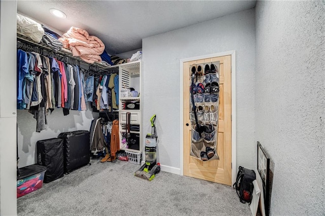 9414 Greenton Rd, Odessa, MO 64076 - walk in closet featuring carpet floors