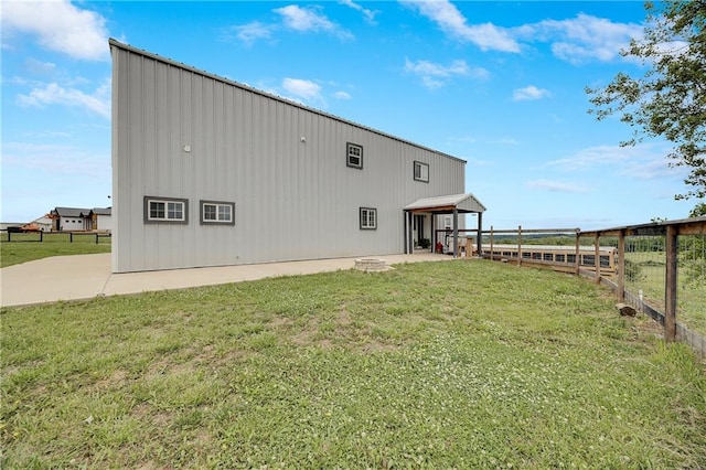 9414 Greenton Rd, Odessa, MO 64076 - back of house with a gazebo, a patio, and board and batten siding