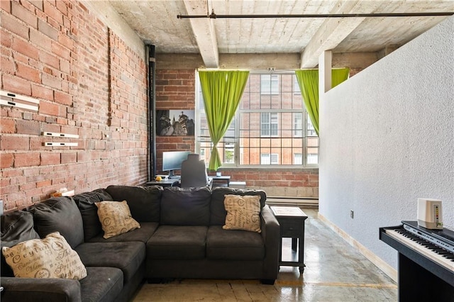 321 W 7th St Unit 501, Kansas City, MO 64105 - living room featuring brick wall, a desk, and a baseboard heating unit