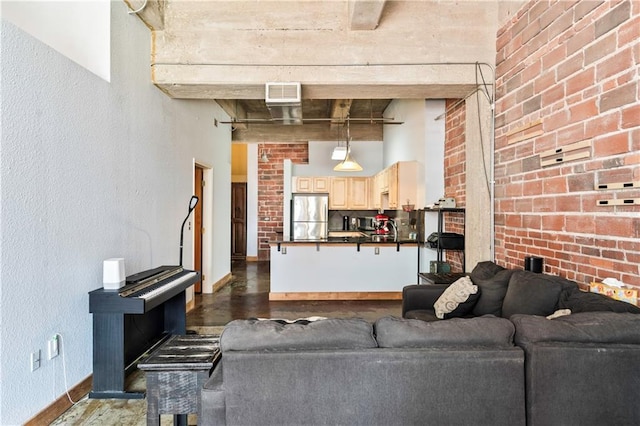 321 W 7th St Unit 501, Kansas City, MO 64105 - living area featuring dark wood-type flooring, a high ceiling, and beam ceiling