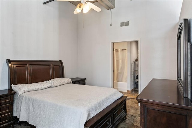 321 W 7th St Unit 501, Kansas City, MO 64105 - bedroom with a towering ceiling, ceiling fan, and connected bathroom