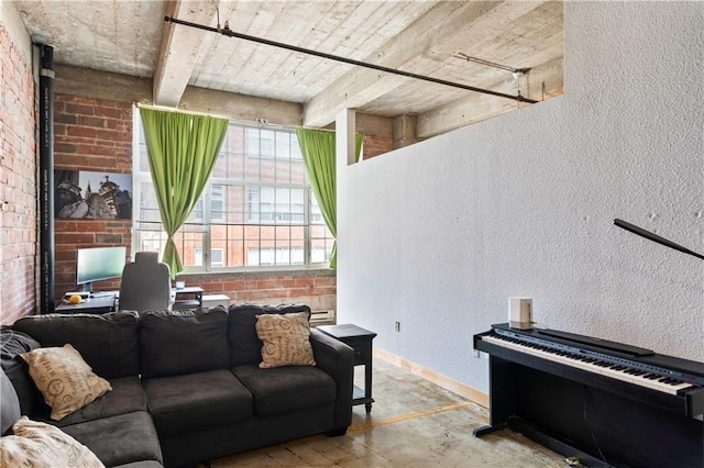 321 W 7th St Unit 501, Kansas City, MO 64105 - living room with concrete floors, an office area, and a textured wall