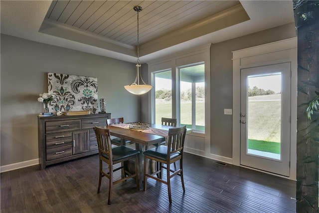 19787 W 114th Pl, Olathe, KS 66061 - dining area featuring a raised ceiling, dark wood-type flooring, healthy amount of natural light, crown molding, and wood ceiling