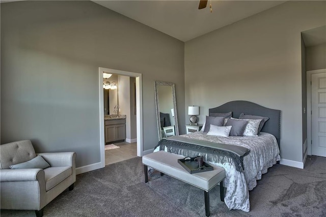 19787 W 114th Pl, Olathe, KS 66061 - bedroom featuring carpet flooring, a chandelier, ensuite bathroom, and vaulted ceiling