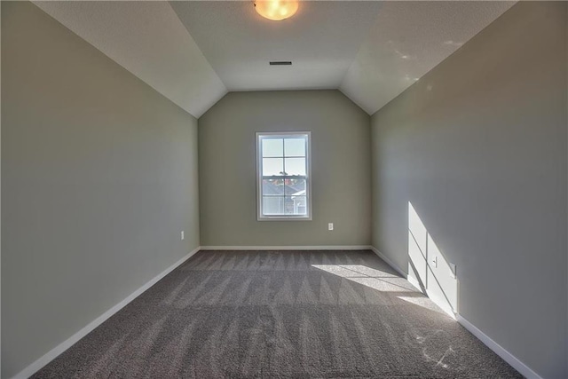 19787 W 114th Pl, Olathe, KS 66061 - carpeted spare room featuring lofted ceiling and baseboards