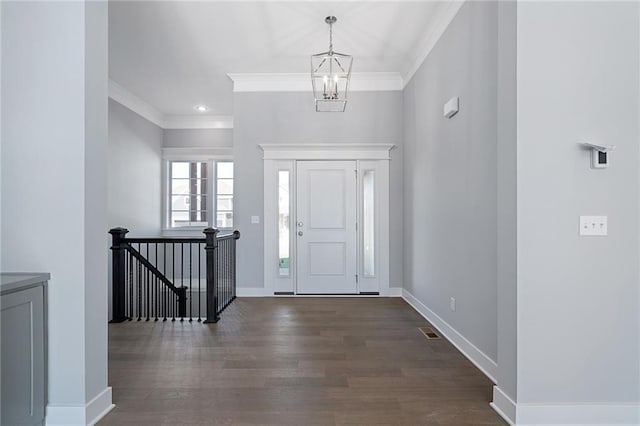 19499 W 114th Ter, Olathe, KS 66061 - entryway with a chandelier, crown molding, dark wood-type flooring, and recessed lighting