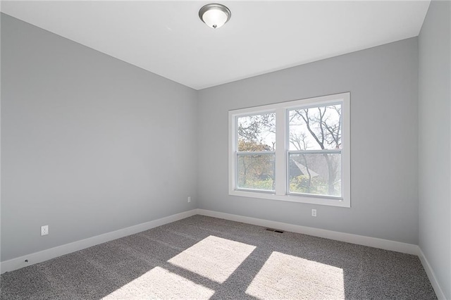 19499 W 114th Ter, Olathe, KS 66061 - spare room featuring carpet flooring