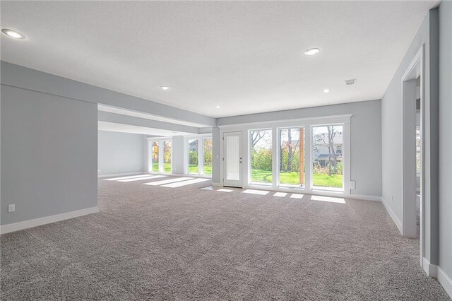 19499 W 114th Ter, Olathe, KS 66061 - carpeted empty room featuring recessed lighting