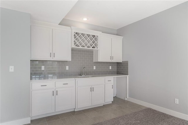 19499 W 114th Ter, Olathe, KS 66061 - kitchen with light countertops, white cabinetry, decorative backsplash, and recessed lighting
