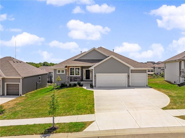 19499 W 114th Ter, Olathe, KS 66061 - ranch-style house with an attached garage, driveway, and a front yard