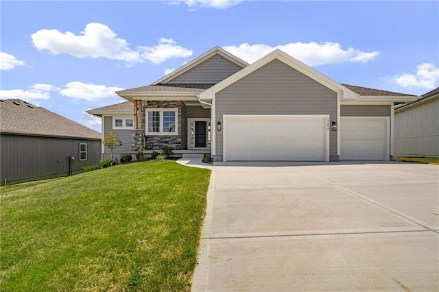 19499 W 114th Ter, Olathe, KS 66061 - view of front facade featuring a garage, a front yard, and concrete driveway