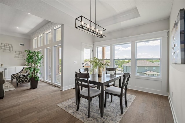 19499 W 114th Ter, Olathe, KS 66061 - dining room with dark wood-style floors, ornamental molding, a chandelier, and recessed lighting