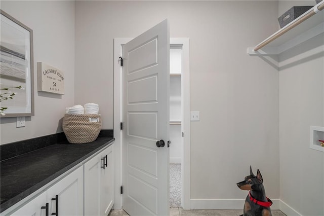 19499 W 114th Ter, Olathe, KS 66061 - laundry room featuring washer hookup and cabinet space