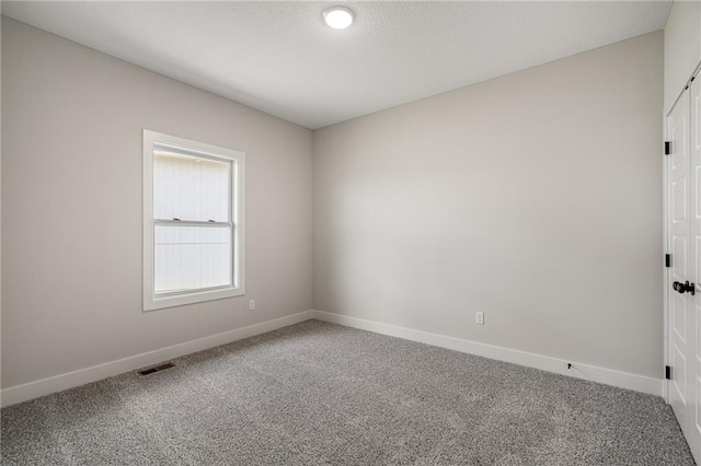19499 W 114th Ter, Olathe, KS 66061 - carpeted empty room featuring baseboards