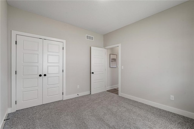 19499 W 114th Ter, Olathe, KS 66061 - unfurnished bedroom featuring carpet floors and a closet
