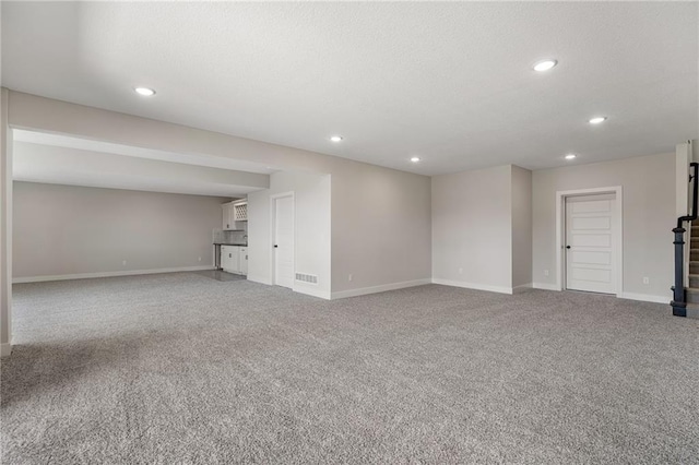 19499 W 114th Ter, Olathe, KS 66061 - below grade area featuring recessed lighting and carpet floors