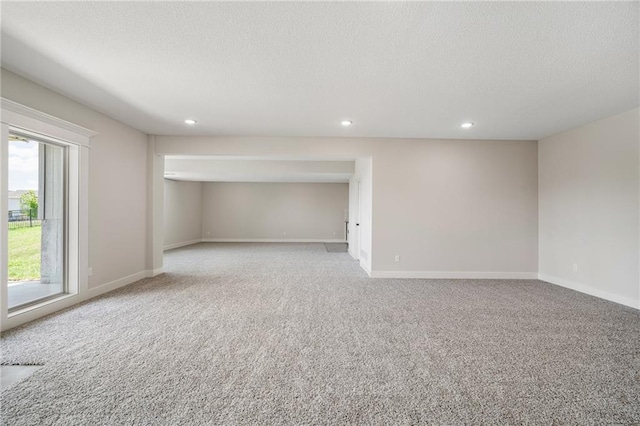 19499 W 114th Ter, Olathe, KS 66061 - carpeted empty room with a textured ceiling and recessed lighting
