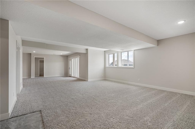 19499 W 114th Ter, Olathe, KS 66061 - spare room featuring carpet flooring, recessed lighting, and a textured ceiling