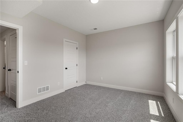 19499 W 114th Ter, Olathe, KS 66061 - carpeted empty room with baseboards