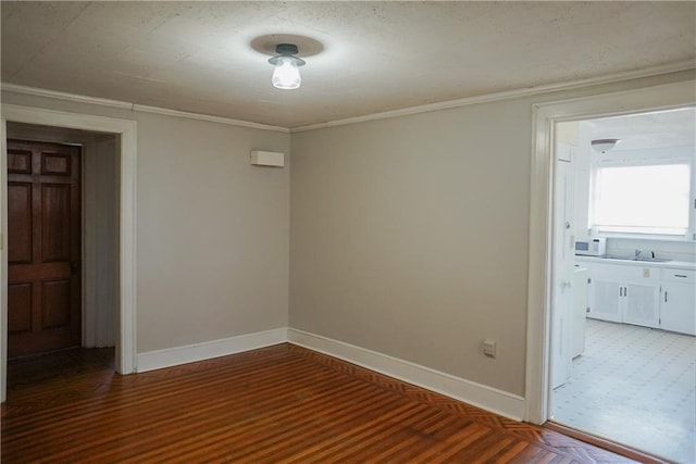 1101 S Broadway St, Leavenworth, KS 66048 - unfurnished room featuring ornamental molding and light wood-style flooring