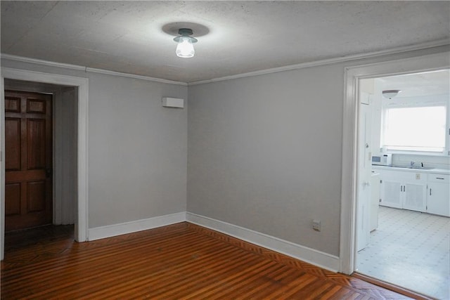 1101 S Broadway St, Leavenworth, KS 66048 - empty room featuring crown molding and wood finished floors