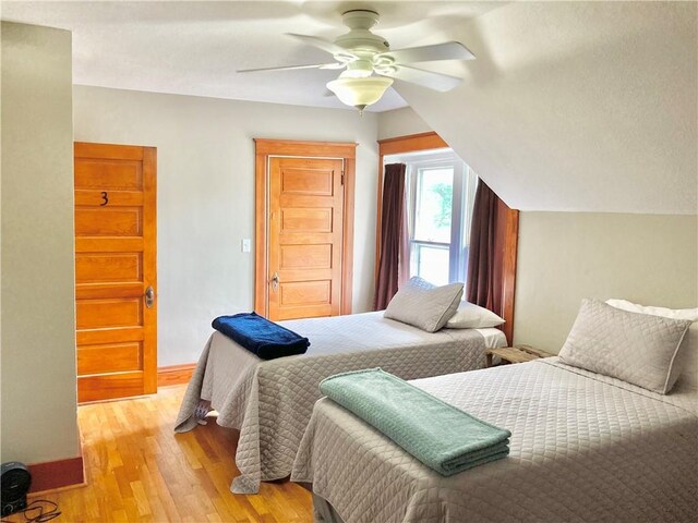 406 S 6th St, Burlington, KS 66839 - bedroom with light wood-type flooring and a ceiling fan