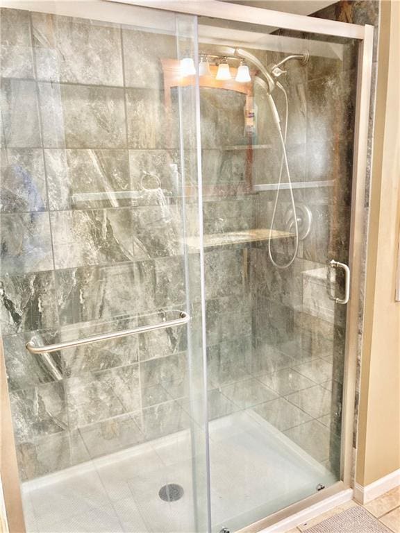 406 S 6th St, Burlington, KS 66839 - full bathroom featuring a stall shower and baseboards