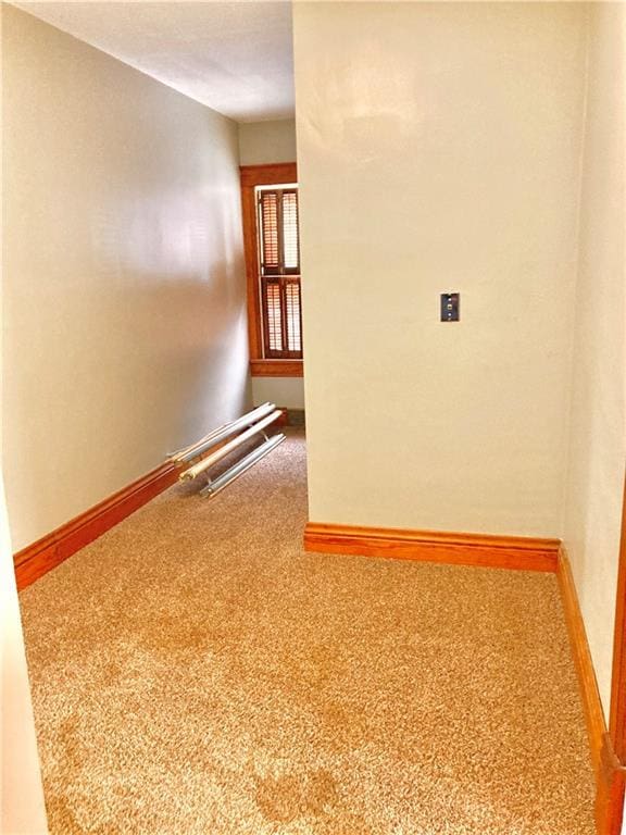 406 S 6th St, Burlington, KS 66839 - carpeted empty room with baseboards