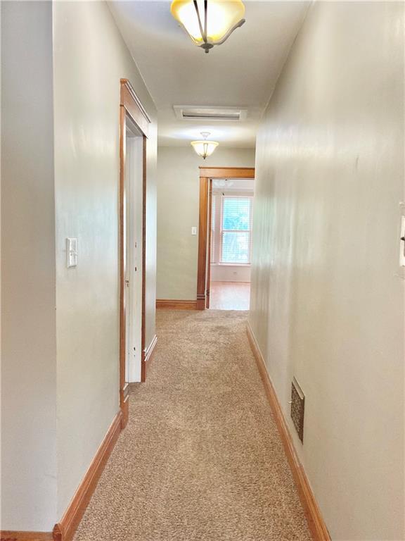 406 S 6th St, Burlington, KS 66839 - hall featuring carpet flooring and attic access