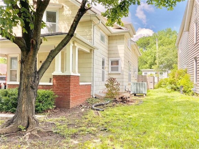 406 S 6th St, Burlington, KS 66839 - view of side of property with a central air condition unit