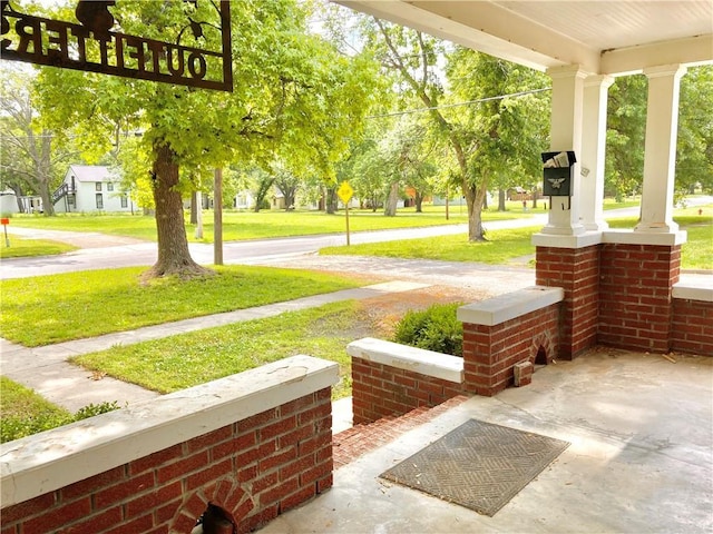 406 S 6th St, Burlington, KS 66839 - covered porch featuring a yard
