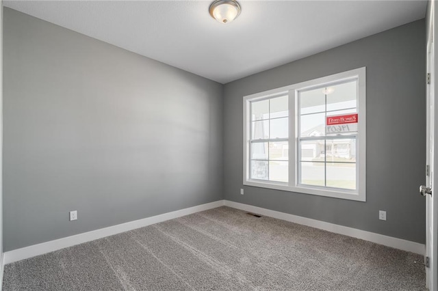 19455 W 114th Ter, Olathe, KS 66061 - unfurnished room with baseboards and carpet floors