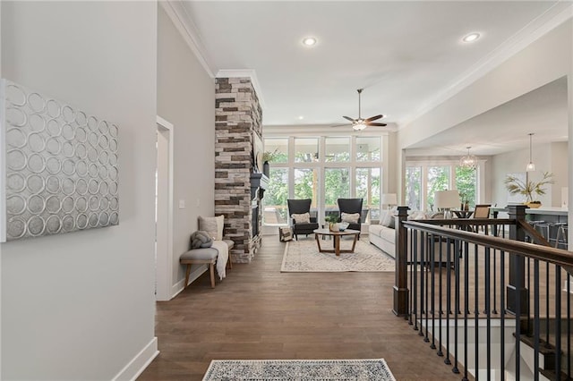 19345 W 114th Ter, Olathe, KS 66061 - hallway featuring ornamental molding, recessed lighting, and wood finished floors