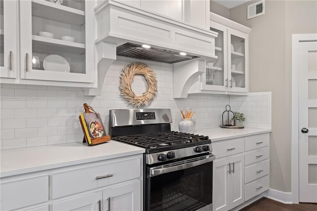 19345 W 114th Ter, Olathe, KS 66061 - kitchen with gas stove, white cabinets, light countertops, and glass insert cabinets
