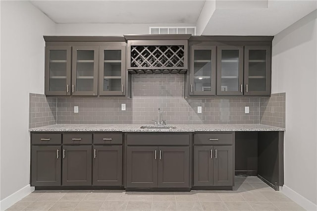 19345 W 114th Ter, Olathe, KS 66061 - indoor wet bar featuring backsplash