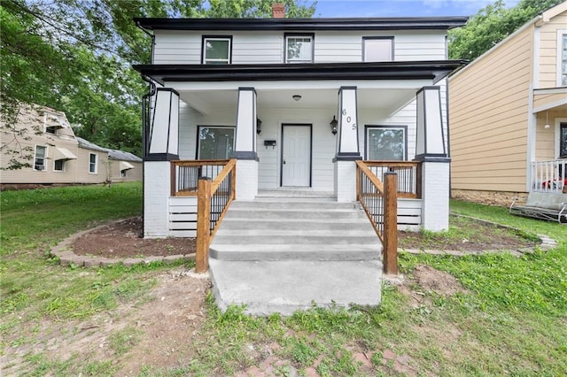 605 Oak St, Leavenworth, KS 66048 - view of front facade featuring covered porch