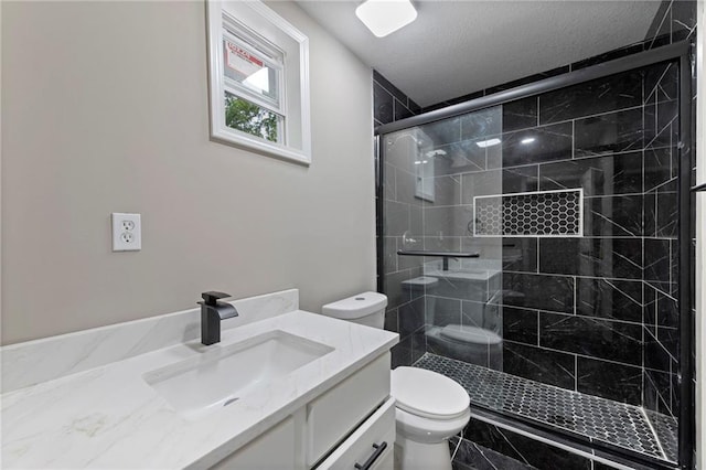 605 Oak St, Leavenworth, KS 66048 - bathroom with vanity, a stall shower, and a textured ceiling