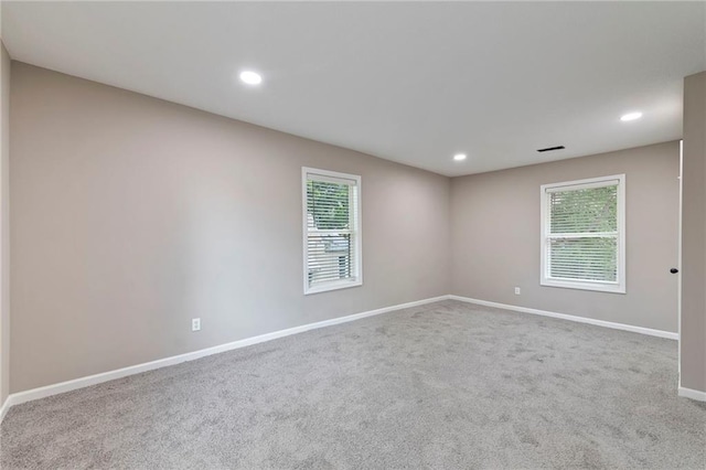 605 Oak St, Leavenworth, KS 66048 - unfurnished room featuring carpet flooring and recessed lighting