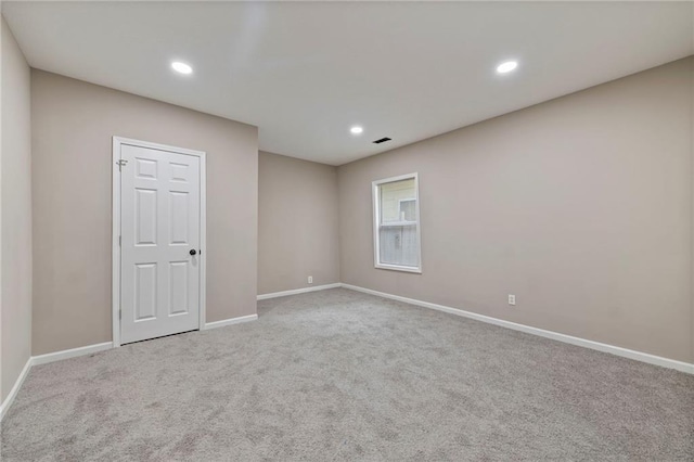 605 Oak St, Leavenworth, KS 66048 - spare room featuring carpet floors and recessed lighting