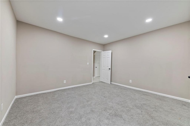 605 Oak St, Leavenworth, KS 66048 - carpeted empty room with recessed lighting