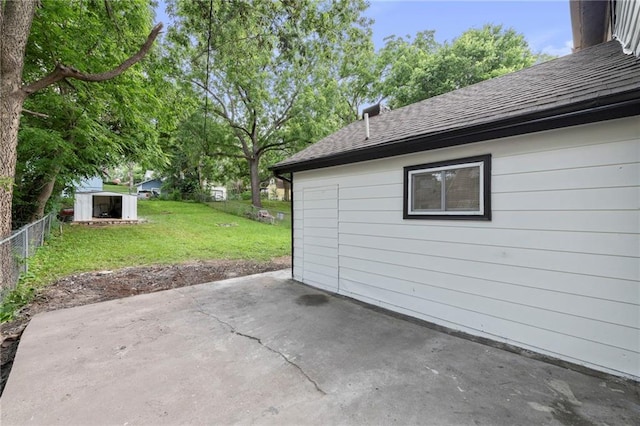 605 Oak St, Leavenworth, KS 66048 - view of patio / terrace with a storage unit
