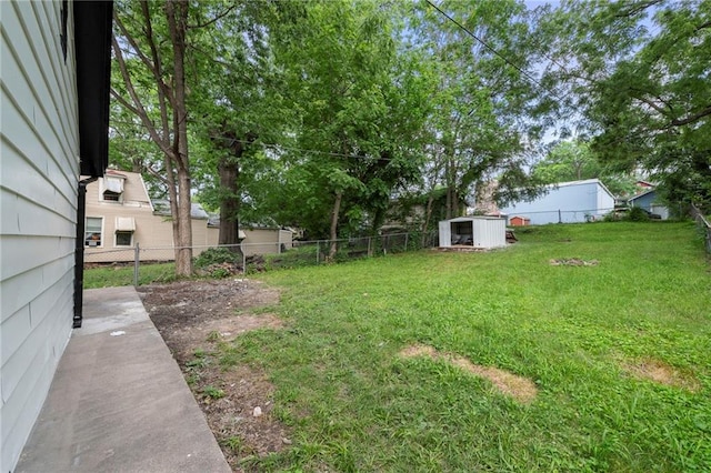 605 Oak St, Leavenworth, KS 66048 - fenced backyard featuring a shed
