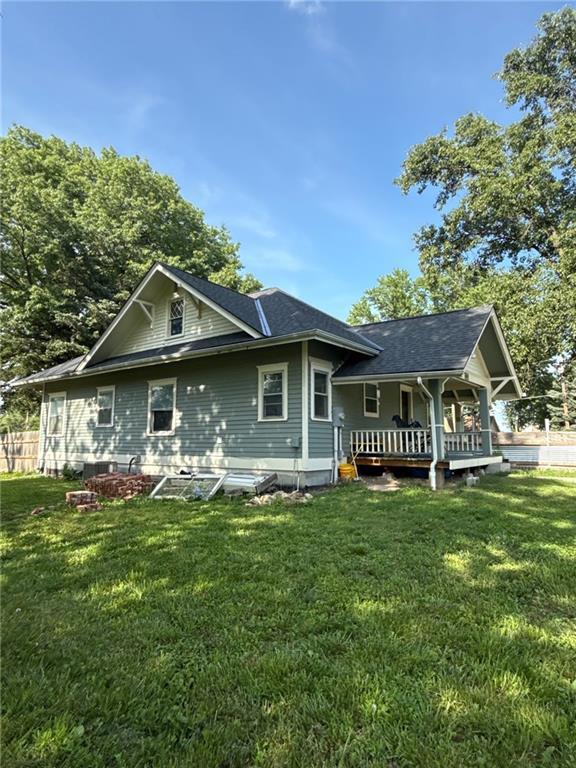 3112 N 155th St, Basehor, KS 66007 - back of house featuring a lawn and covered porch