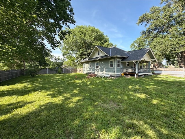 3112 N 155th St, Basehor, KS 66007 - rear view of house featuring a fenced backyard and a wooden deck