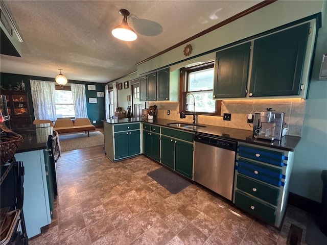 3112 N 155th St, Basehor, KS 66007 - kitchen with dishwasher, dark countertops, a textured ceiling, a peninsula, and green cabinets