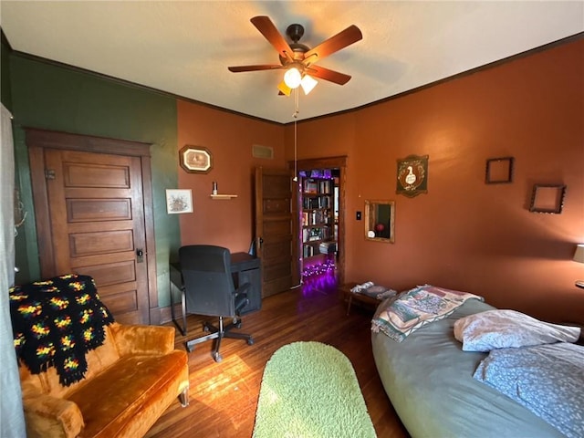 3112 N 155th St, Basehor, KS 66007 - office area featuring a ceiling fan, wood finished floors, and ornamental molding