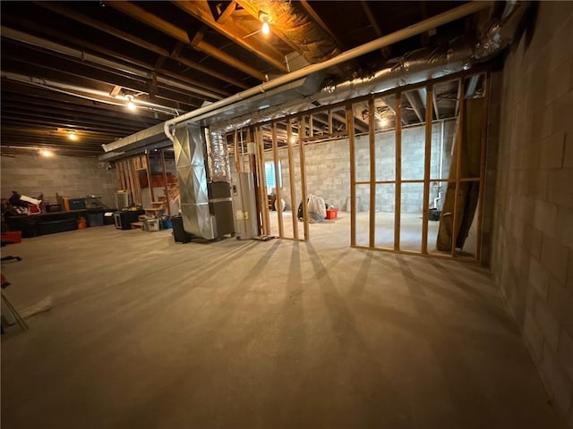3112 N 155th St, Basehor, KS 66007 - unfinished basement with heating unit and concrete block wall